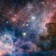 Illustration for article titled This eye-popping mosaic takes us inside the beautiful Carina Nebula